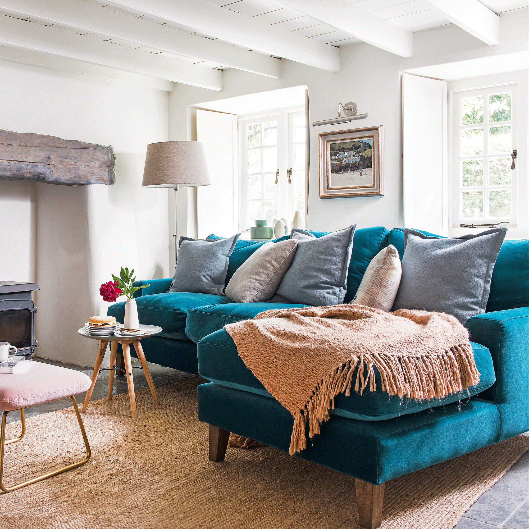 Teal corner sofa in cottage living room