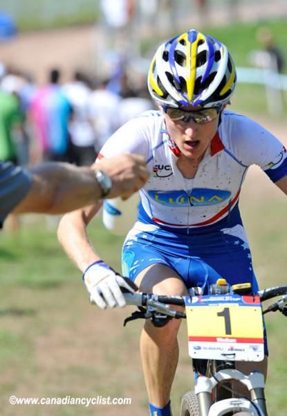 Catharine Pendrel (Luna Pro Team) takes a feed.