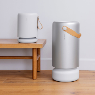 two Molekule air purifiers next to each other in different sizes