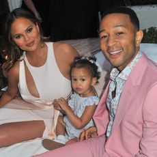 Chrissy Teigen, Luna Simone Stephens and John Legend attend John Legend's launch of his new rose wine brand, LVE, during an intimate Airbnb Concert