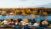 Riverside houses, sunset, Thames river, Surrey UK