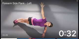 Fitbit instructor leading a core workout