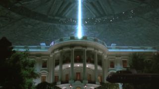 An flying saucer beam is sent through the White House in Independence Day