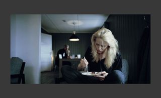 A woman eating something