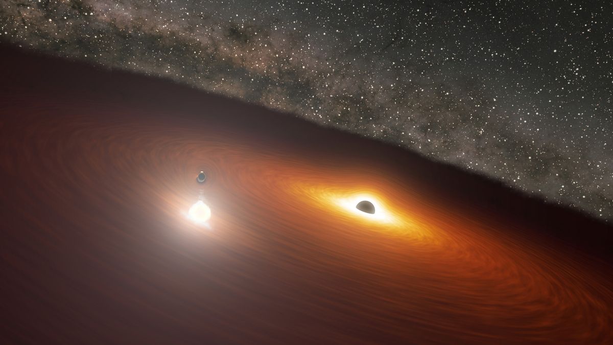 This artist&#039;s impression shows two massive black holes in the OJ 287 galaxy.