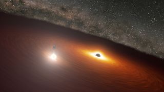 This artist's impression shows two massive black holes in the OJ 287 galaxy.