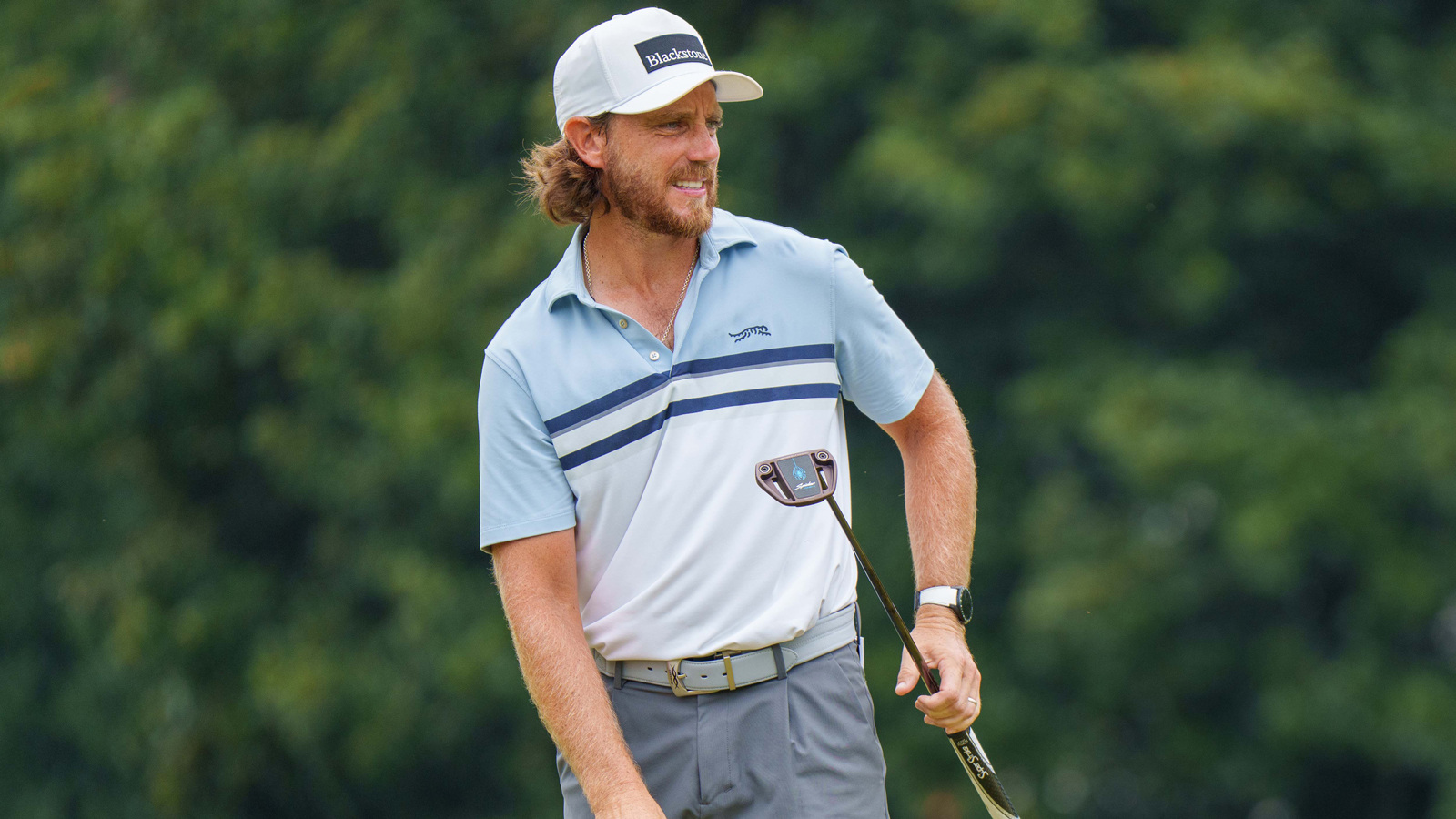 Tommy Fleetwood reacts to a putt