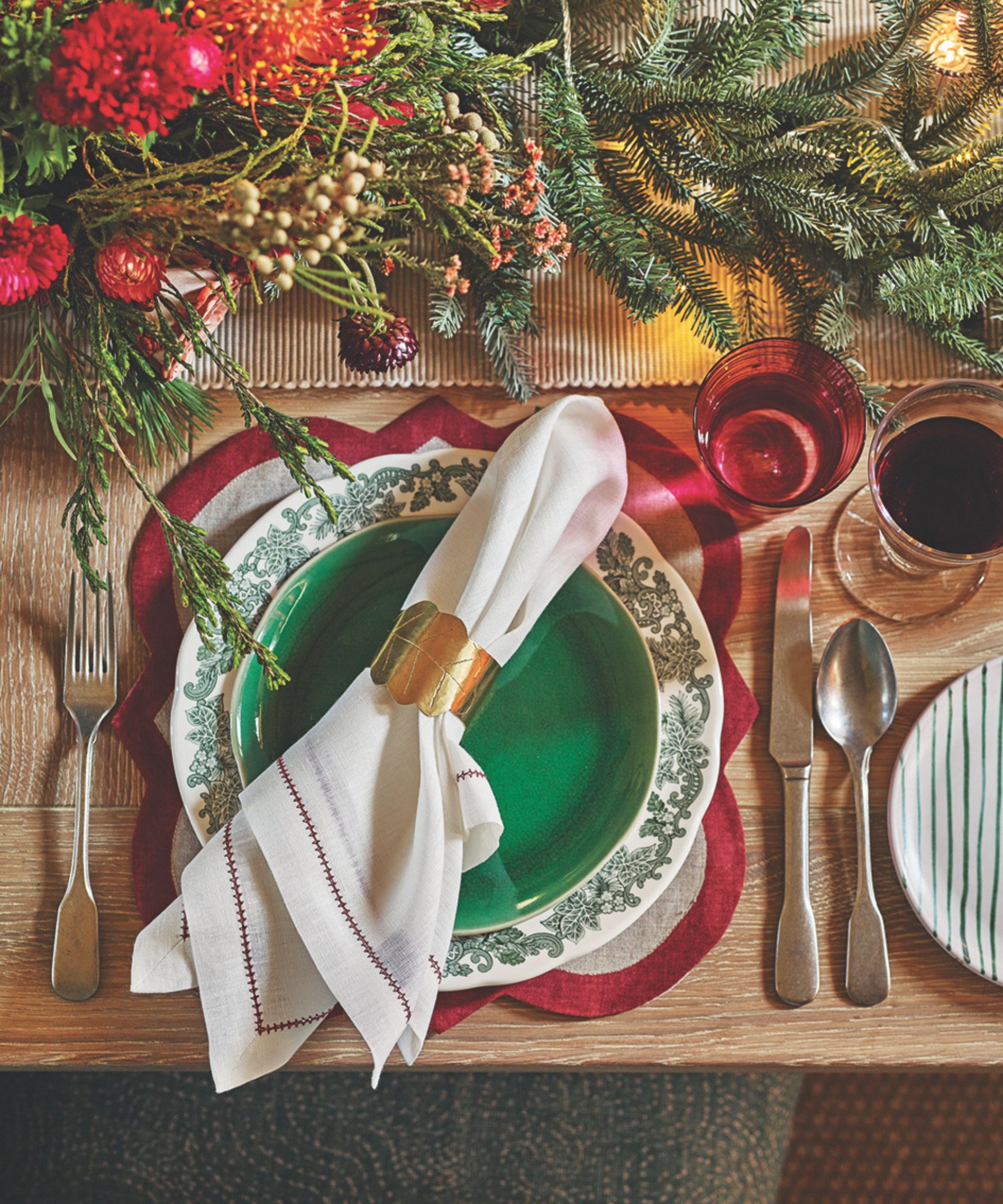 Green and red themed Christmas table setting