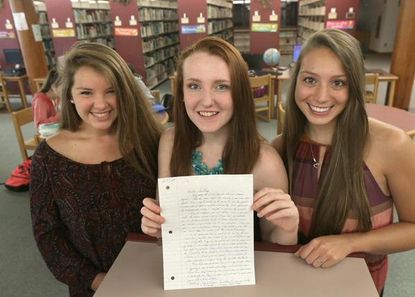 Students show off the letter they received from James "Whitey" Bulger.