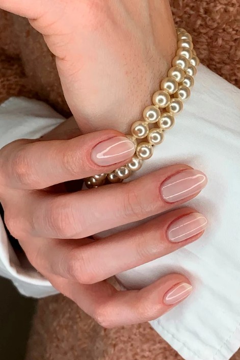 A soft white manicure.