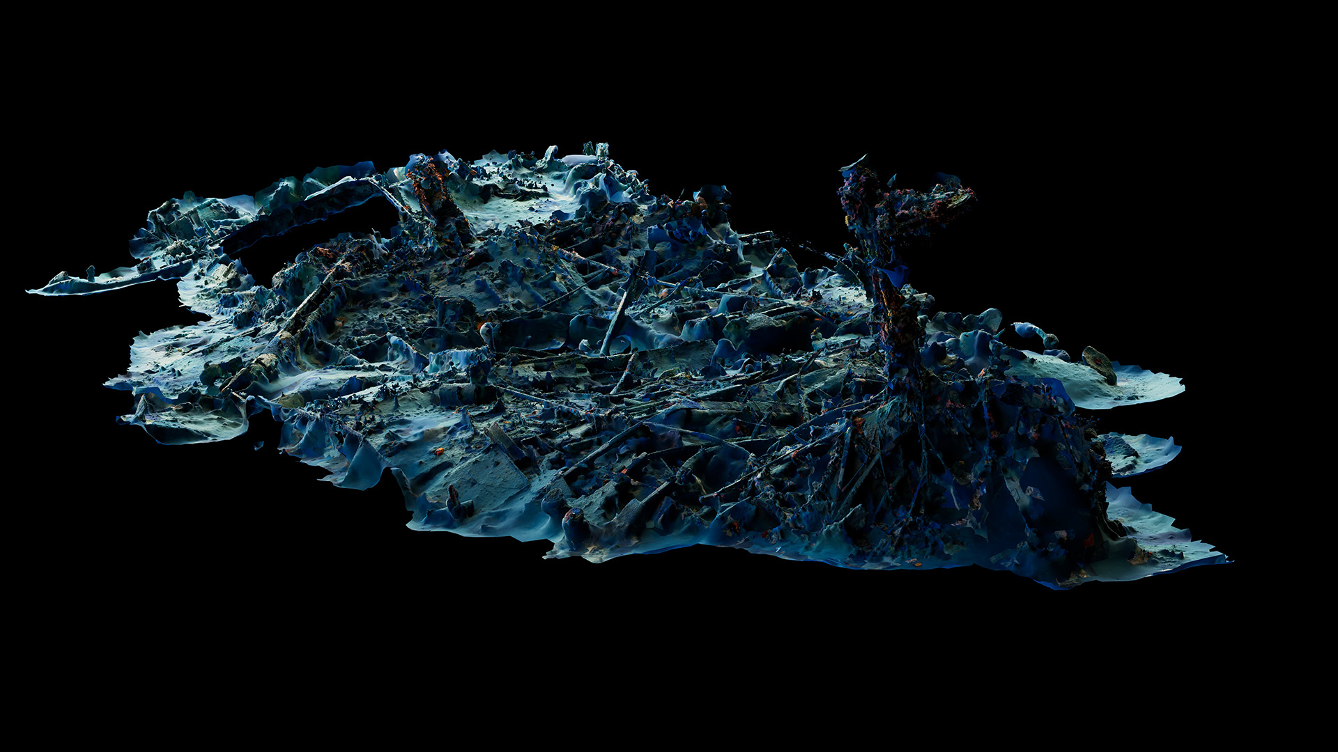A blue 3D reconstruction of a shipwreck on the bottom of the ocean against a black background
