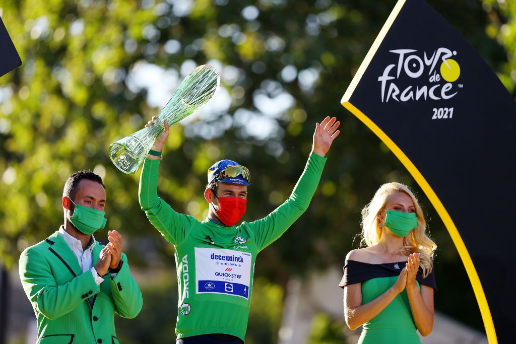 PARIS FRANCE JULY 18 Mark Cavendish of The United Kingdom and Team Deceuninck QuickStep Green Points Jersey celebrates at podium during the 108th Tour de France 2021 Stage 21 a 1084km stage from Chatou to Paris Champslyses Trophy LeTour TDF2021 on July 18 2021 in Paris France Photo by Tim de WaeleGetty Images