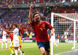 Xabi Alonso celebrates his first goal for Spain against France in the quarter-finals of Euro 2012.