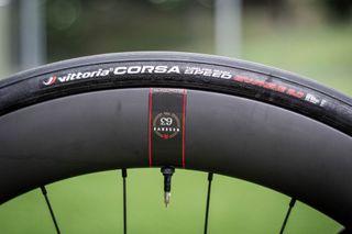 Detail of Vittoria tires and Reserve wheels on Jonas Vingegaard's Cervelo S5