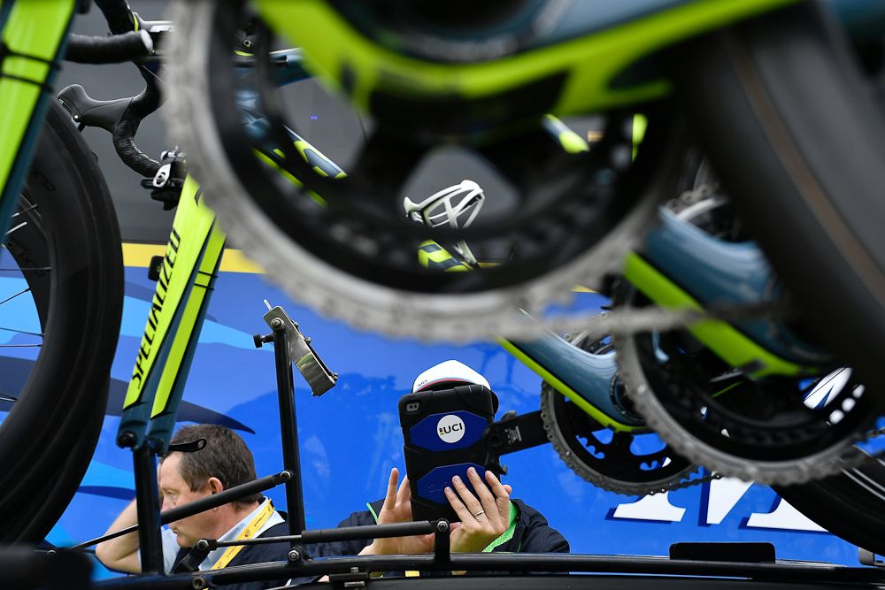 A UCI inspector examines bikes to detect hidden motors ahead of stage 4 at the 2016 Tour de France
