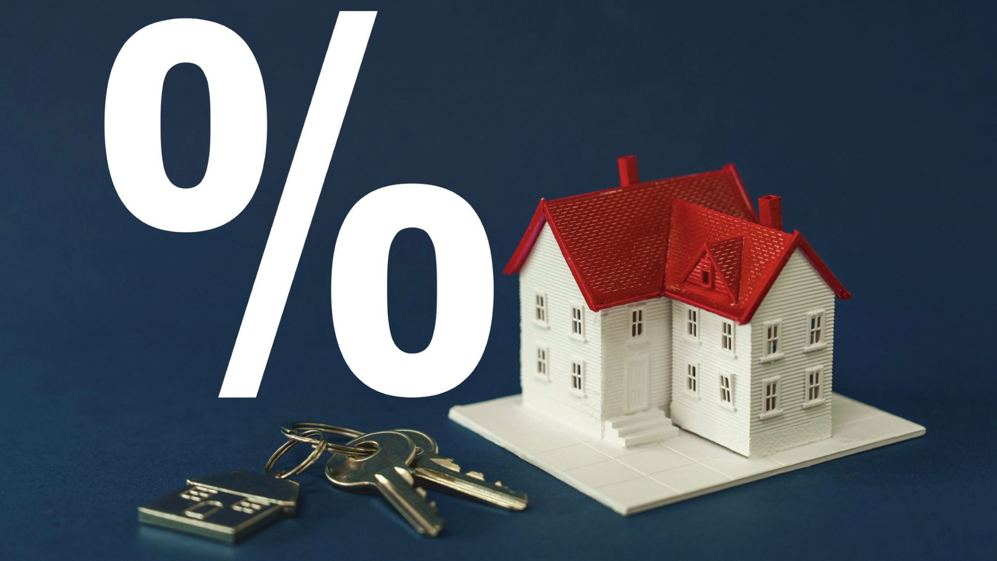 A tiny model home on a blue background with a large percent sign next to it and a set of keys. 