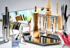 Silver objects by Gio Ponti including hand, tray and candle holder