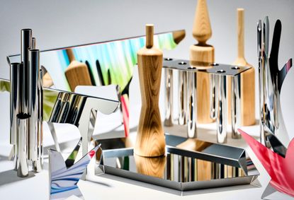 Silver objects by Gio Ponti including hand, tray and candle holder