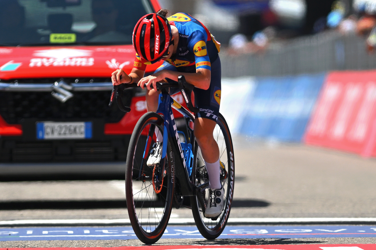 An exhausted Gaia Realini crosses the line on stage 7