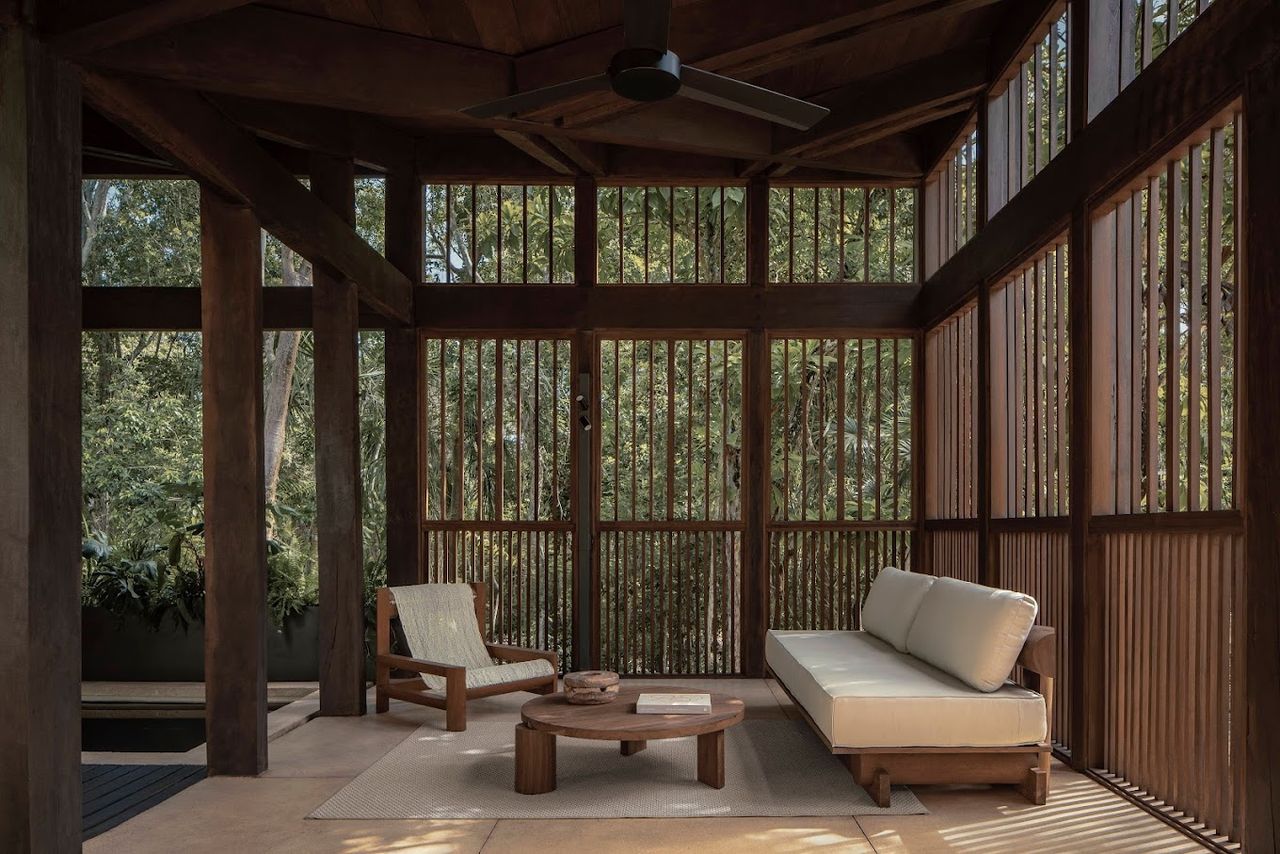 A modernist Mexican hotel immersed in nature and wooden furnishings.