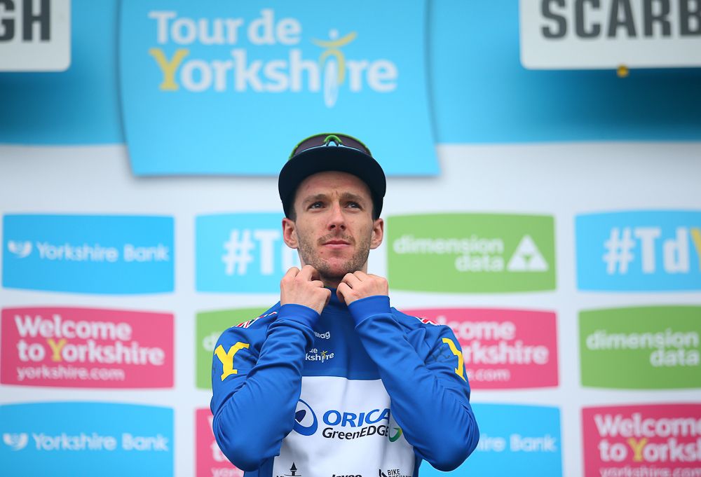 Adam Yates (Orica-GreenEdge) wears the blue jersey on the final podium at Tour de Yorkshire