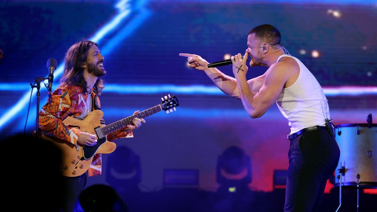 Daniel Wayne Sermon and Dan Reynolds of Imagine Dragons perform onstage