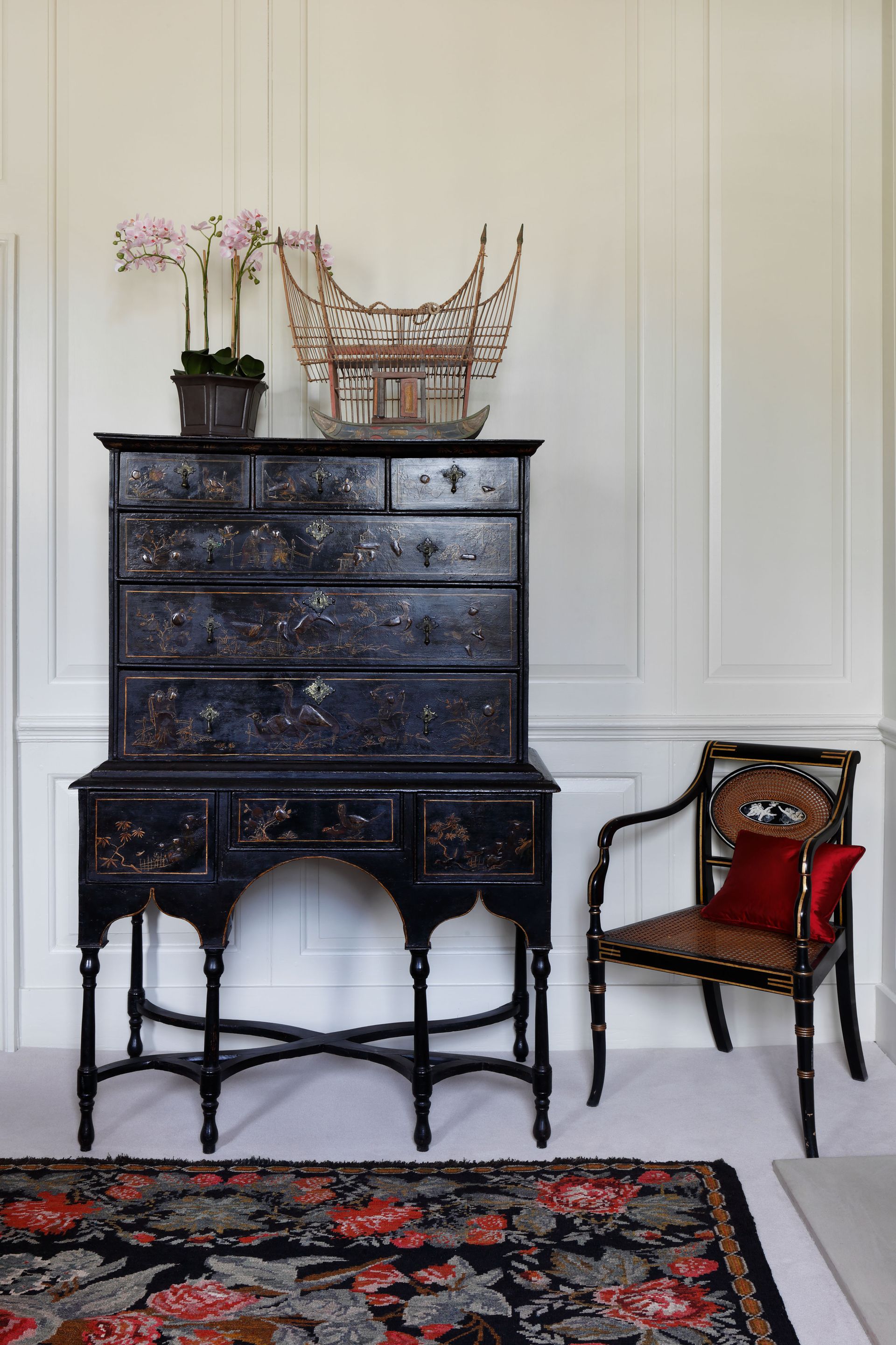 Dark wood furniture and chair and patterned rug