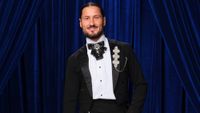 Val Chermokovskiy posing for a photo on Dancing with the Stars. 
