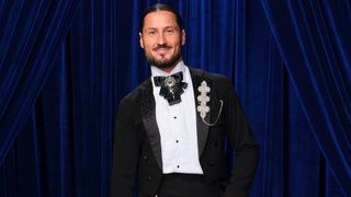 Val Chermokovskiy posing for a photo on Dancing with the Stars. 