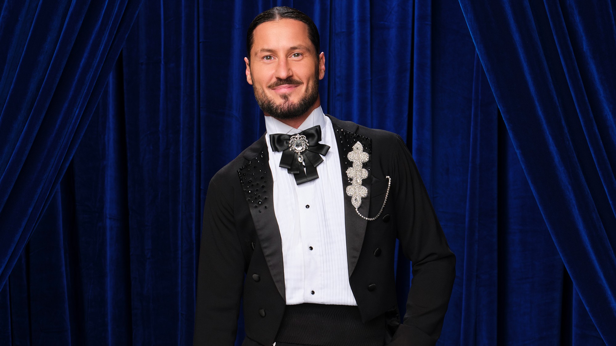 Val Chermokovskiy posing for a photo on Dancing with the Stars. 