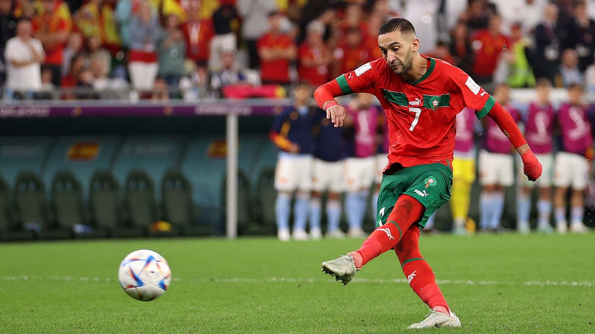 Hakim Ziyech of Morocco scores the team&#039;s second penalty in the penalty shoot out during the FIFA World Cup Qatar 2022 Round of 16 match between Morocco and Spain at Education City Stadium on December 6, 2022 in Al Rayyan, Qatar.