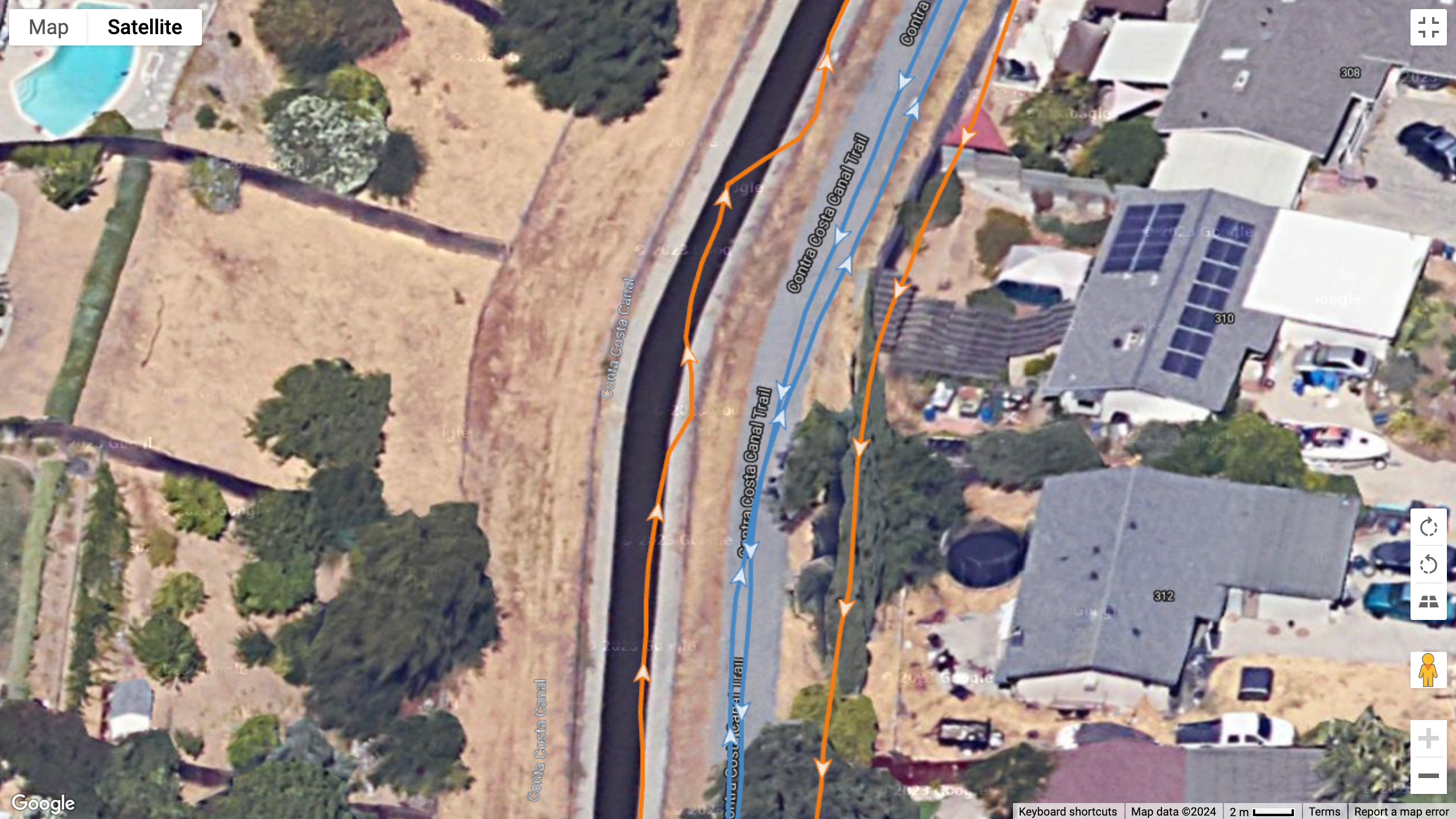 A GPS map showing how the Garmin Forerunner 965 (blue line) compares to the Pixel Watch 3 (orange line) for GPS accuracy. Garmin does significantly better, while Google strays off the track.