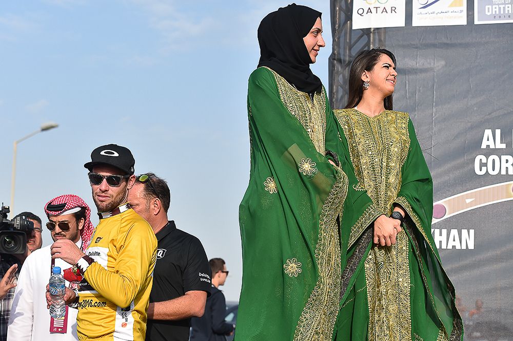Cavendish waits in the wings during the Qatar stage 1 podium presentation.