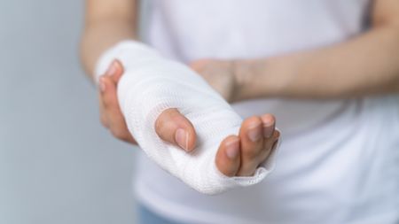Person with bandaged wrist