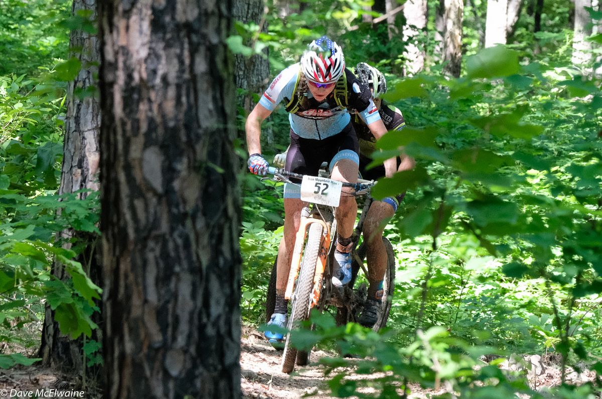 Rose Grant (Stans NoTubes-Pivot) weaving her way through the dense forest with Anthony in tow