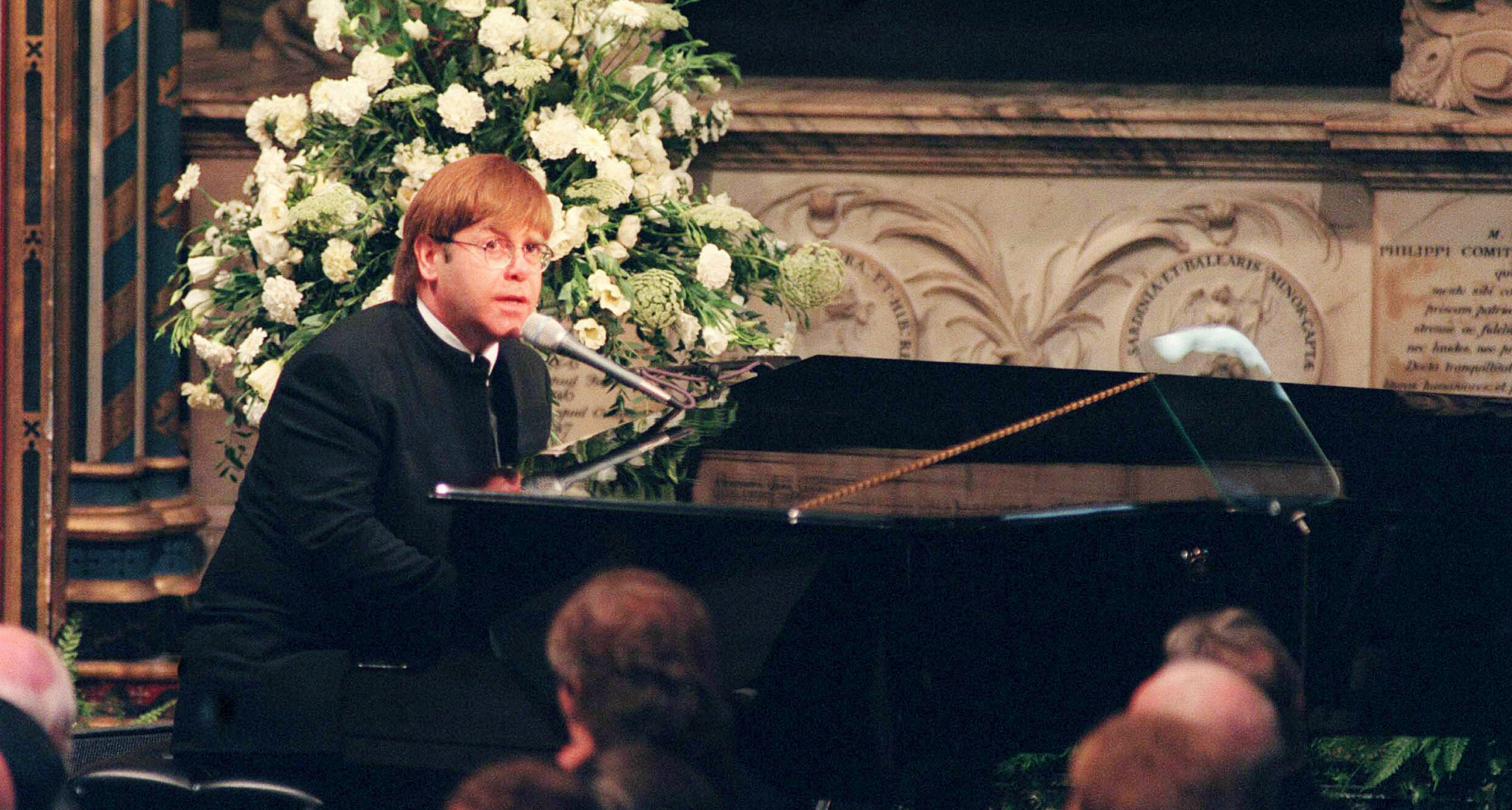 Elton John playing the piano at Princess Diana's funeral