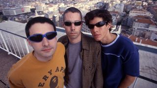 A group portrait of Beastie Boys in Portugal circa 1998