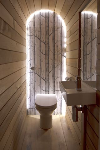 A bathroom wallpaper highlighted by LEDs