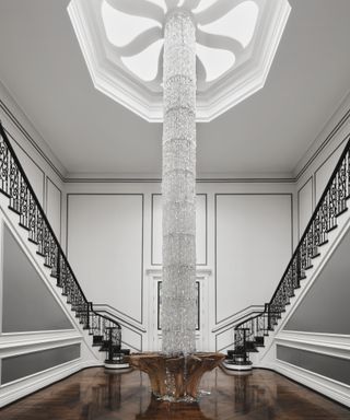 Max Azria's hallway with large chandelier