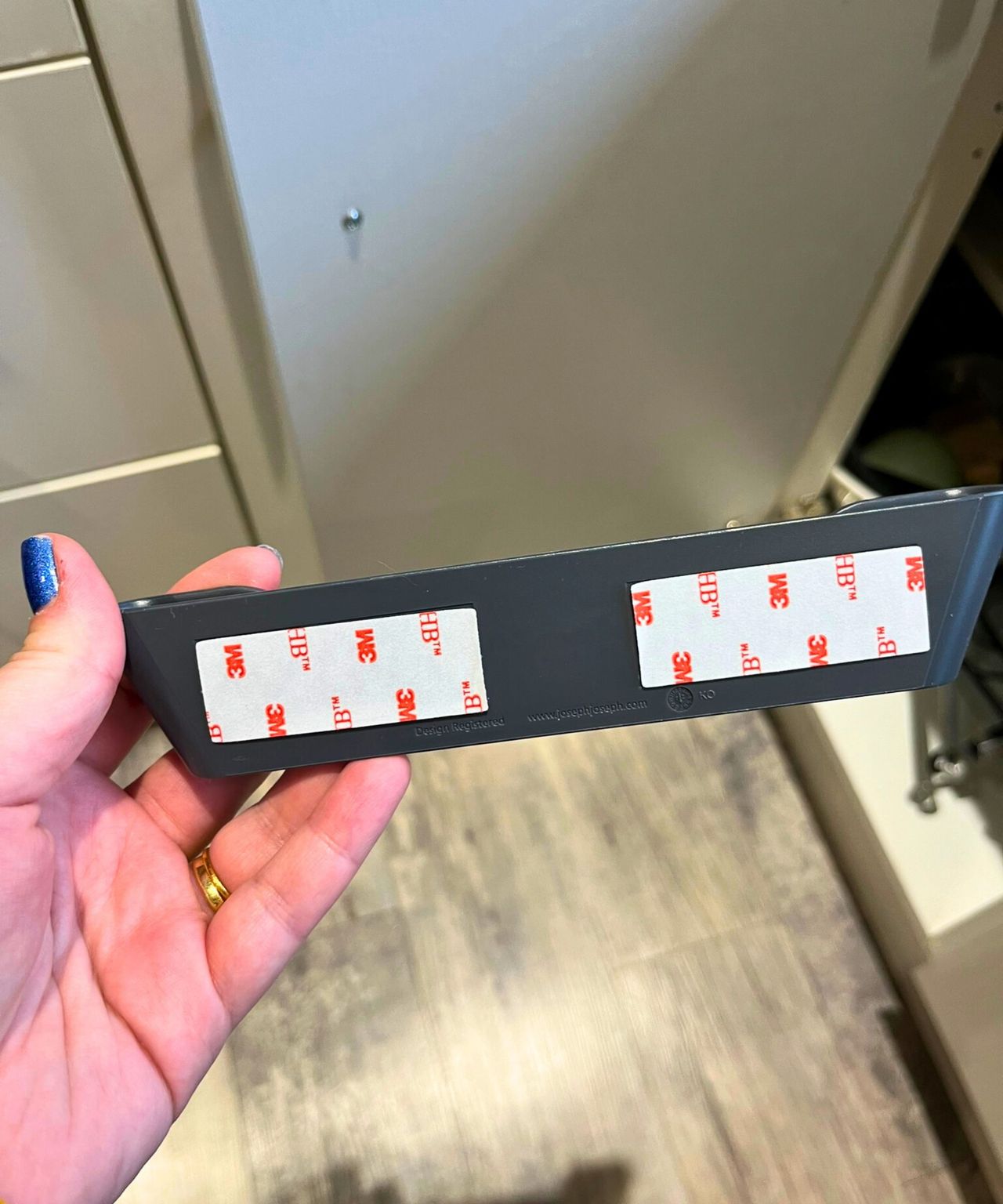 Sticky backing on the pan lid organizer