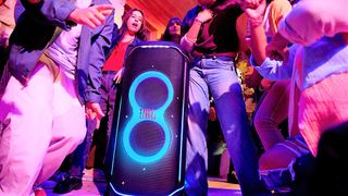 press image of JBL PartyBox Ultimate light-up speaker surrounded by dancers