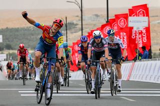 Lidl-Trek team's Italian rider Jonathan Milan reacts as he wins the first stage of the UAE Tour cycling race from Shams Solar Power Station Madinat Zayed to Liwa Palace in Abu Dhabi on February 17, 2025. (Photo by Giuseppe CACACE / AFP)