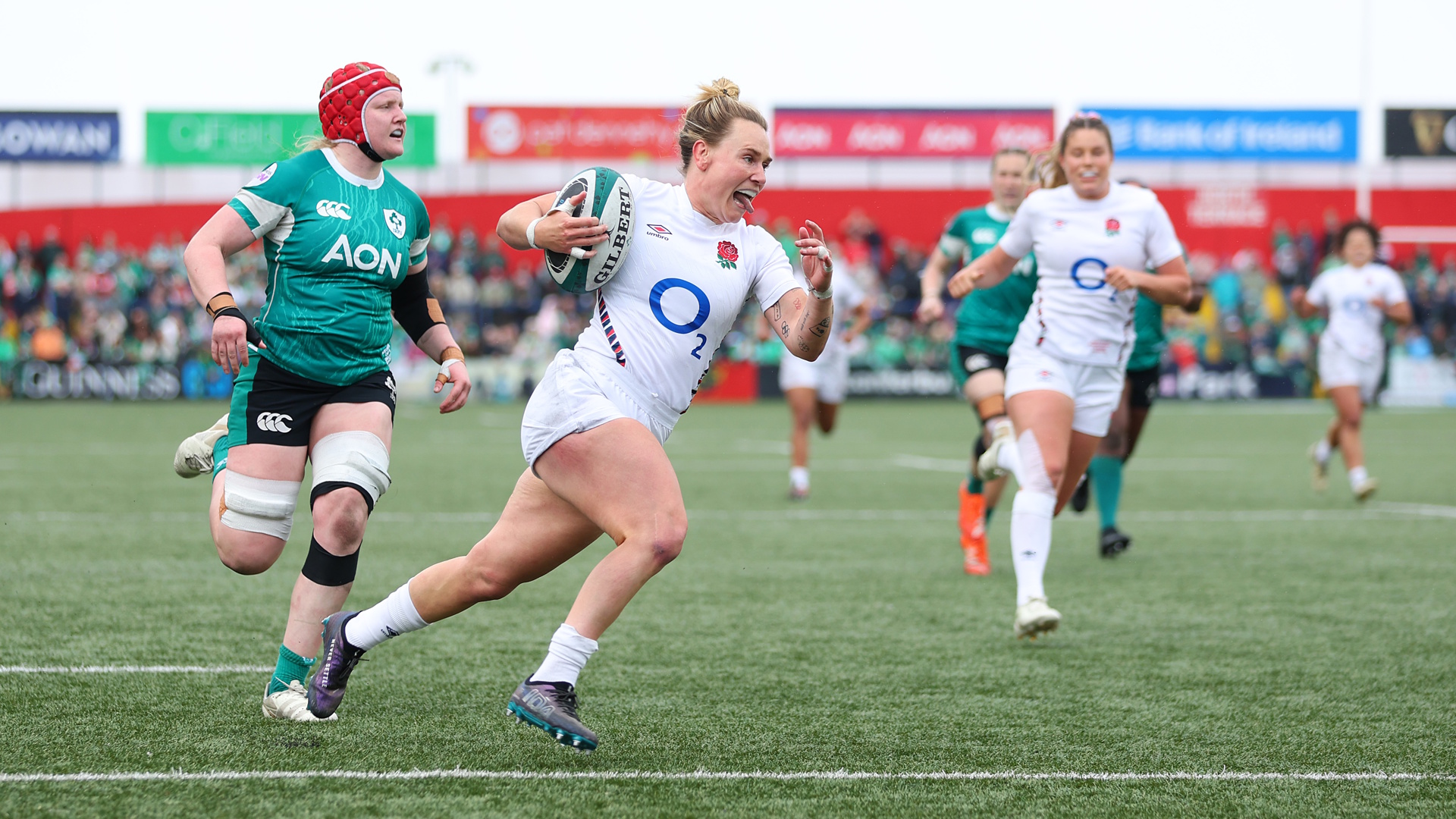 Megan Jones of England scoring a try against Ireland during a Women's Six Nations match.
