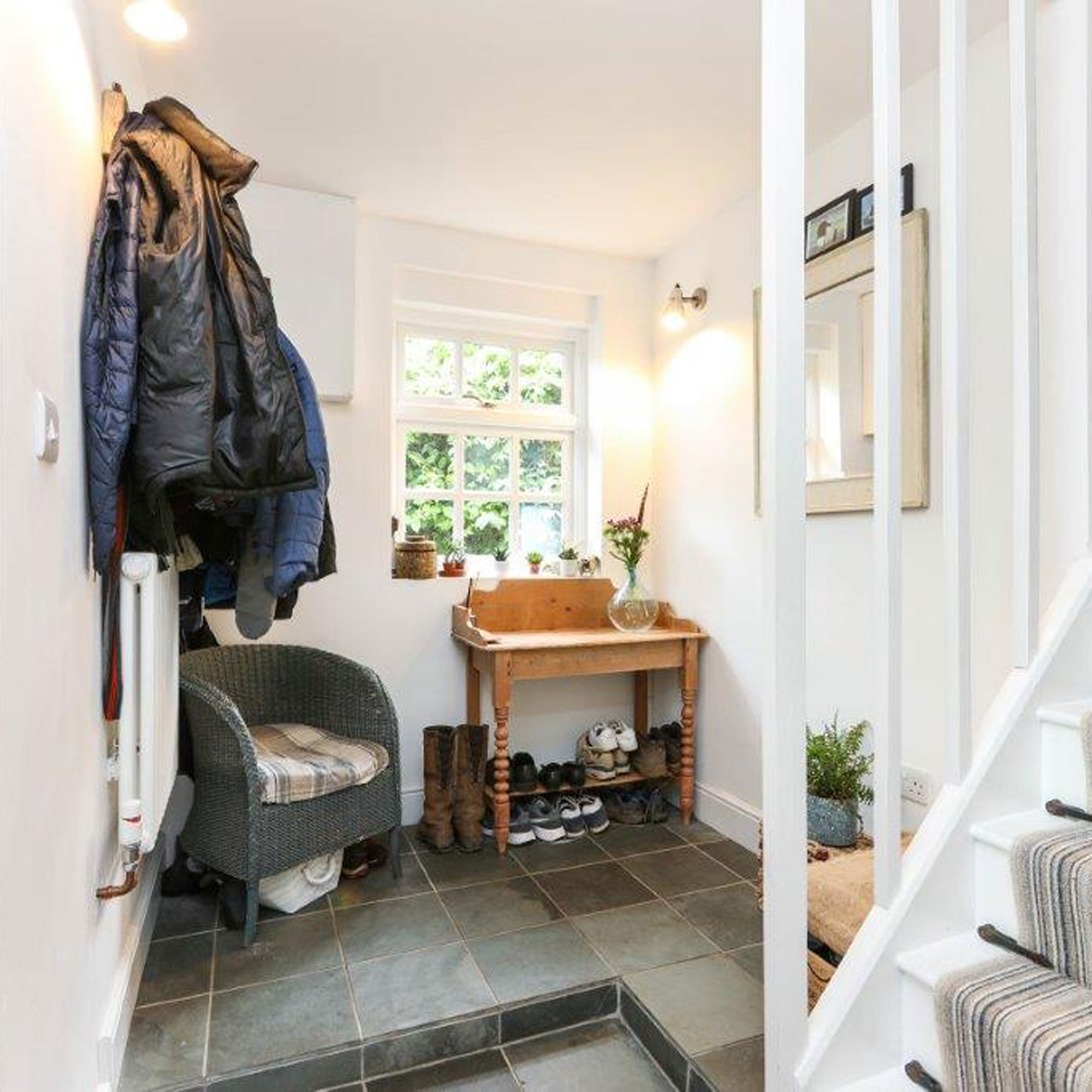 small hallway with slate flooring