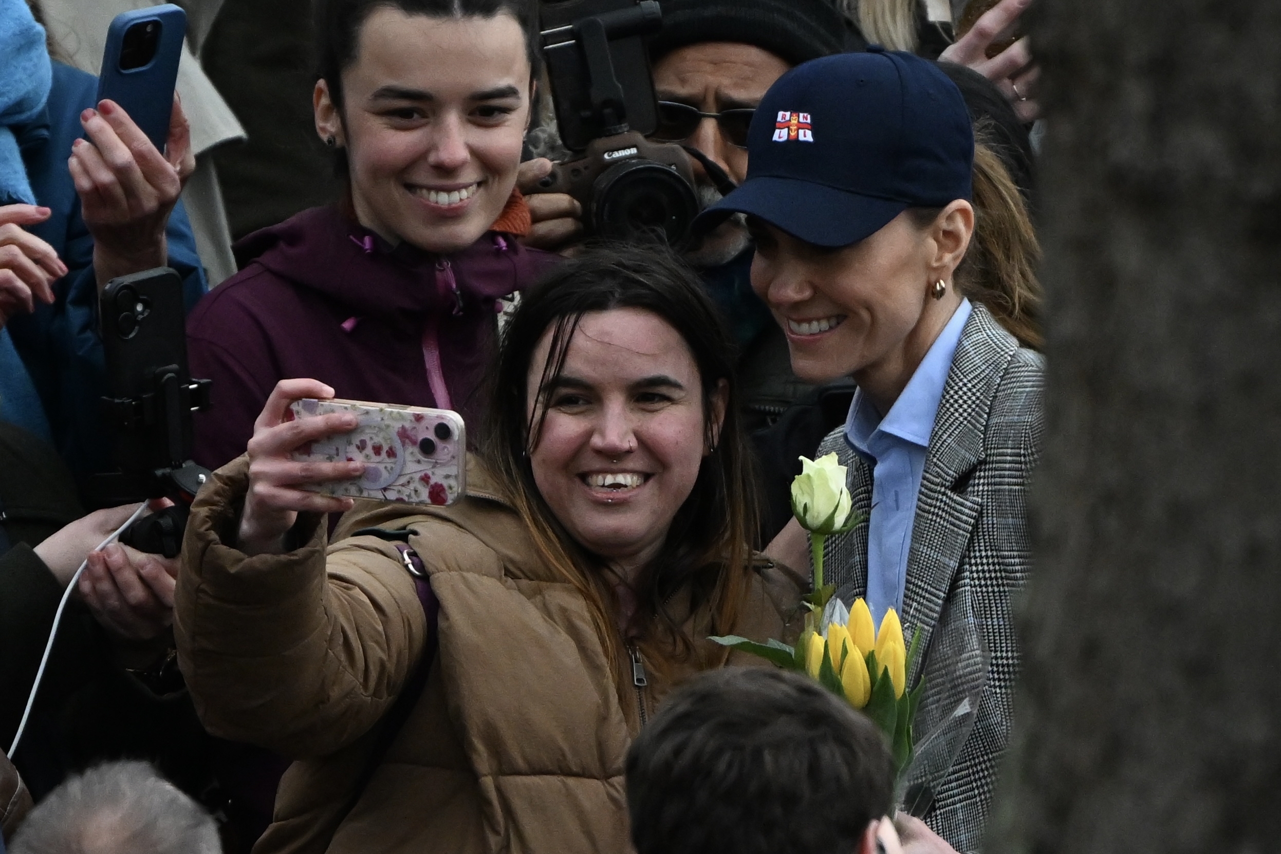 LONDON, UNITED KINGDOM - MARCH 12: The Prince of Wales, Prince William, (not seen) and the Princess of Wales, Catherine (R), depart from the RNLI Tower Lifeboat Station in London, United Kingdom on March 12, 2026. The royal couple met with the RNLI lifeboat crew and volunteers operating on the River Thames and received information about their life-saving work. (Photo by Rasid Necati Aslim/Anadolu via Getty Images)