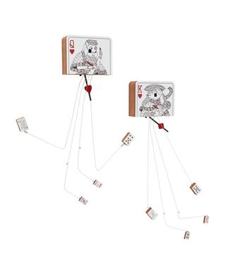 An image showing cuckoo clocks are disguised as playing cards