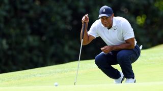 Tiger Woods of the United States putts on the fifth green during the first round of the 2023 Masters Tournament at Augusta National Golf Club on April 06, 2023 in Augusta, Georgia. 