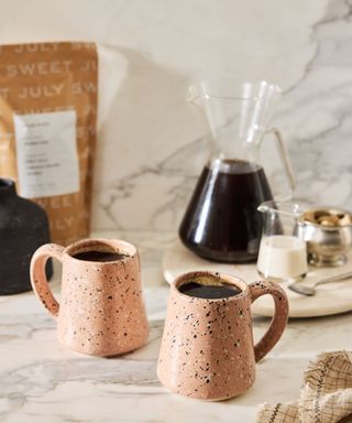 ayesha curry's coffee corner featuring her chai collection mugs