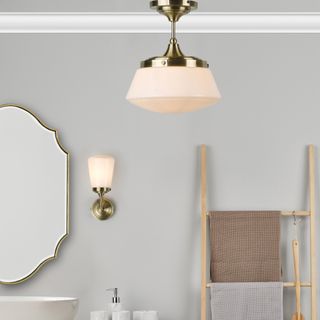 Traditional bathroom scheme with classic pendant and matching gold wall light