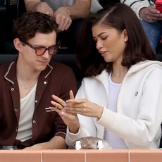 Zendaya and Tom Holland at the French Open wearing matching jackets